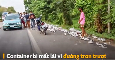 Clip container chở bia lật, hàng trăm người chạy đến ‘hôi của’
