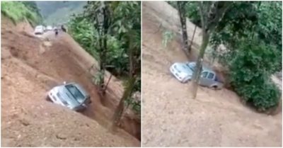 Video đất đá sạt từ trên núi xuống đường, cuốn trôi chiếc ôtô bán tải