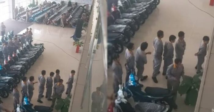 Công nhân xếp hàng dài nhận thưởng Tết. Ảnh từ clip.