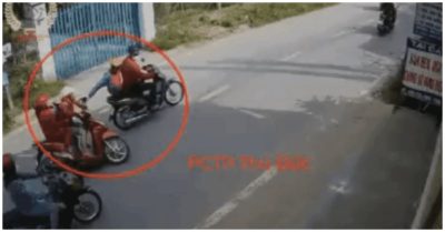 Người đàn ông giật dây chuyền rồi kéo cô gái ‘bay’ khỏi chiếc xe máy