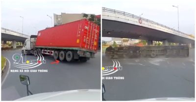 Ôm cua tốc độ cao, xe container lật nhào ra đường