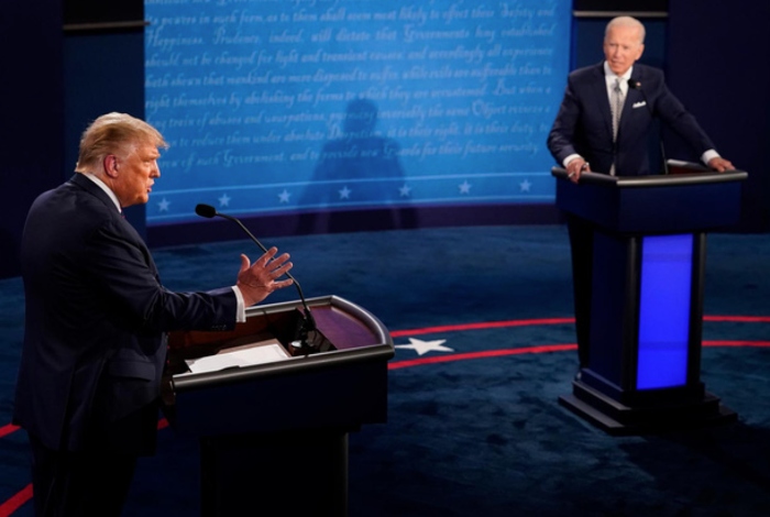Cựu Tổng thống Donald Trump và tân Tổng thống Joe Biden cuộc tranh cử năm 2020 - Ảnh chụp màn hình báo VTV. 

