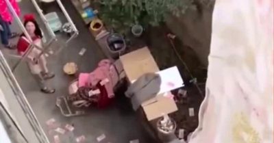 Video quỹ đen của chồng bay lả tả khắp chung cư khi vợ mang chăn ra phơi