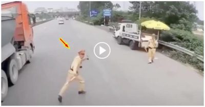 Video khoảnh khắc CSGT co chân chạy thoát thân khi xe container lao tới