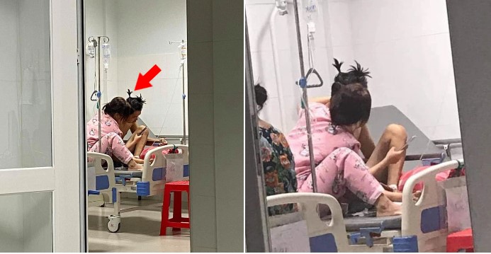 Hình ảnh cô gái chăm sóc người yêu trong bệnh viện