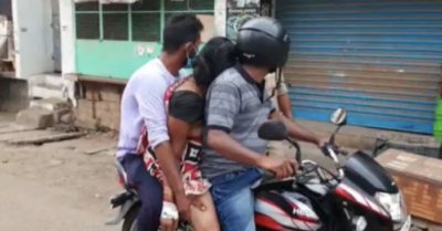 Video hai con chở xác mẹ đi hỏa táng bằng xe máy