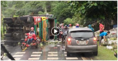 Video ấm lòng ngày mưa: Người dân giúp tài xế xe tải bị lật thu gom chuối