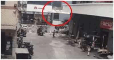 Video đang đi đổ rác, người phụ nữ bị chiếc giường sắt rơi trúng đầu