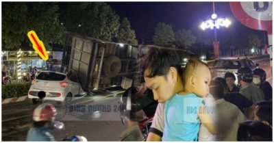 Xe tải chở lợn lật đè đầu ôtô 4 chỗ, cha nhanh chóng phá cửa ôm con nhỏ thoát ra ngoài