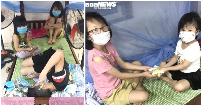 Bố mất, mẹ và anh trai dương tính Covid-19 đang điều trị 2 bệnh viện khác, hai chị em Tuyết tự chăm sóc nhau (ảnh chụp màn hình trên VTC News).