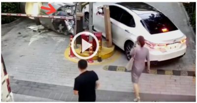 Video: Nữ tài xế húc đổ bốt bảo vệ