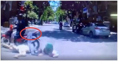 Video áo chống nắng cuốn vào bánh xe, cô gái ngã trước mũi ôtô