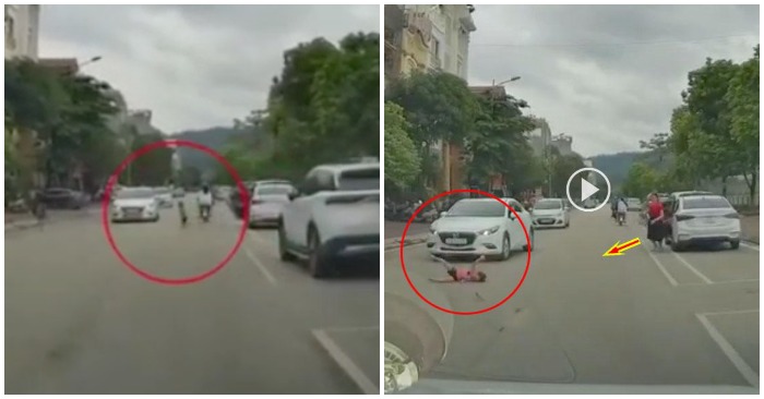 Người mẹ bất cẩn mở cửa xe để con chạy sang đường bị ô tô húc văng (ảnh cắt từ clip).