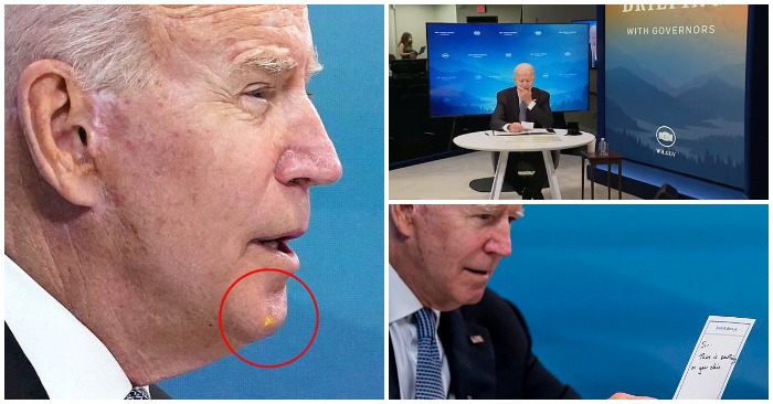 Hôm 30/7/2021, trợ lý nhắc có gì đó trên cằm của ông Joe Biden (ảnh chụp màn hình Twitter).
