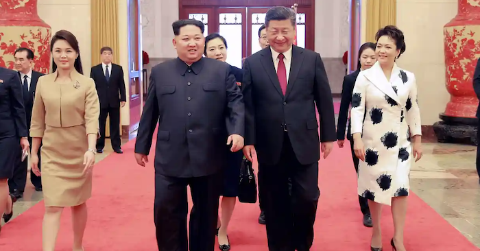 Lãnh đạo Triều Tiên Kim Jong Un và Chủ tịch Trung Quốc Tập Cận Bình gặp nhau tại Trung Quốc vào tháng 3/2019 (ảnh chụp màn hình KCNA).