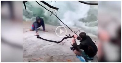 Video lấy khăn và áo bện thành dây, cứu 2 người đàn ông mắc kẹt dưới vách đá