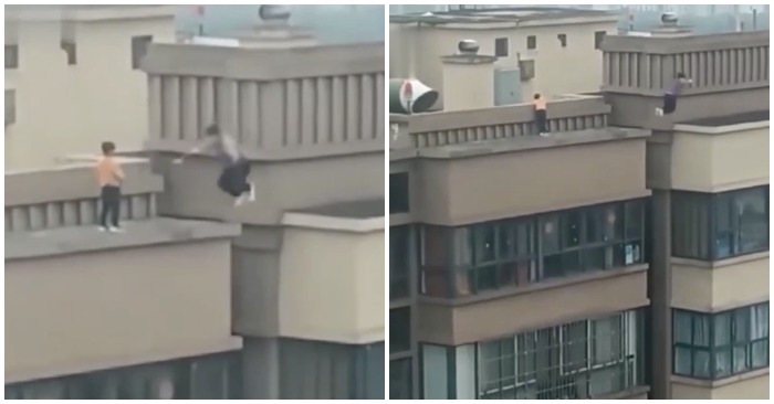 Bé trai nhảy nhót qua lại giữa 2 toà nhà 22 tầng (ảnh cắt từ clip).