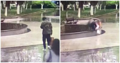 Clip: Mải xem điện thoại, nam thanh niên ngã vục mặt xuống đài phun nước