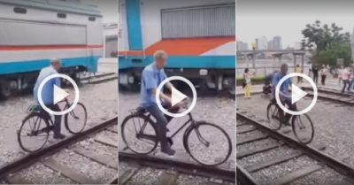 Video: Cụ ông đi xe đạp thăng bằng trên đường ray nhỏ xíu